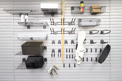 Slatwall Accessory Kits deluxe set with wire shelves, baskets, hooks, and bins organizing garage tools and bags on a slat wall panel