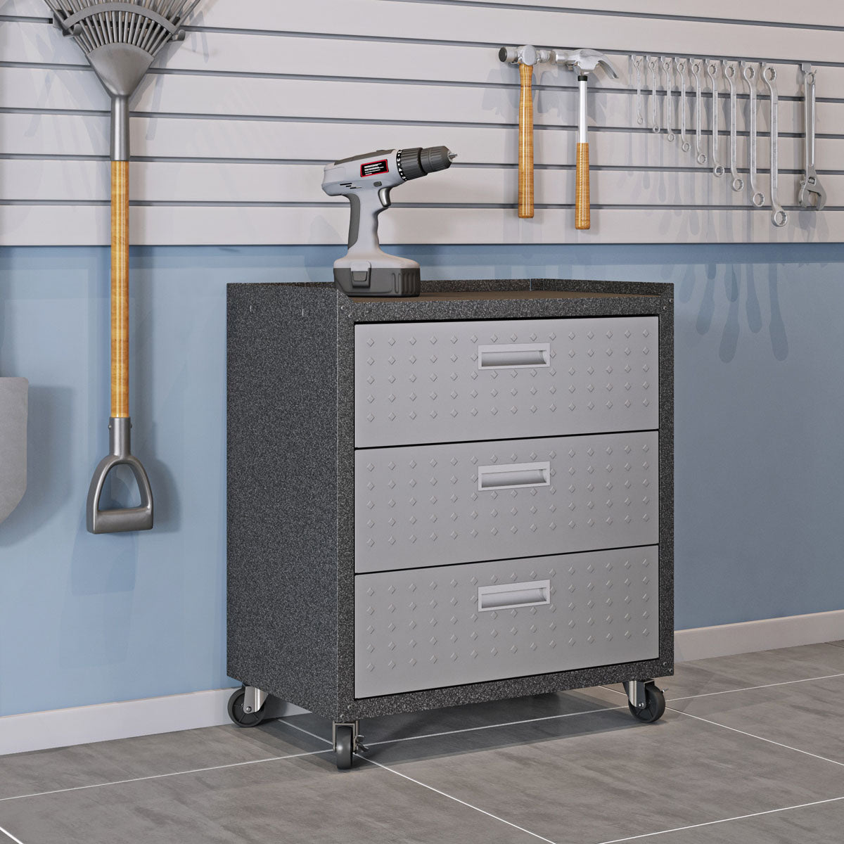 Garage Cabinet Sets with 3 drawers on casters, diamond-plate fronts, holding a drill, beside wall-mounted tools in organized garage__DarkGray