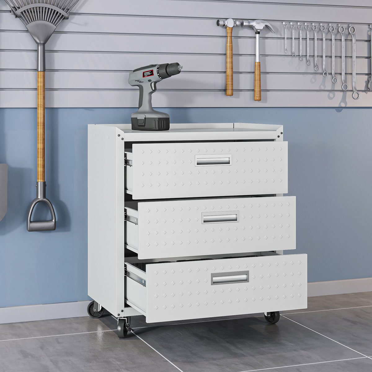 Garage Cabinet Sets with 3 open drawers on wheels, drill on top, tools hung on slatwall behind in organized garage__White