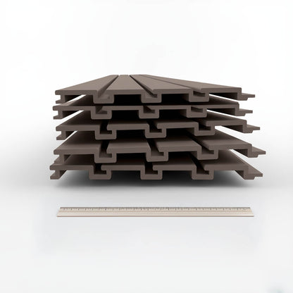 Slatwall Panels stacked in a set, taupe-colored 12" wide grooved PVC boards shown with ruler for scale__Taupe