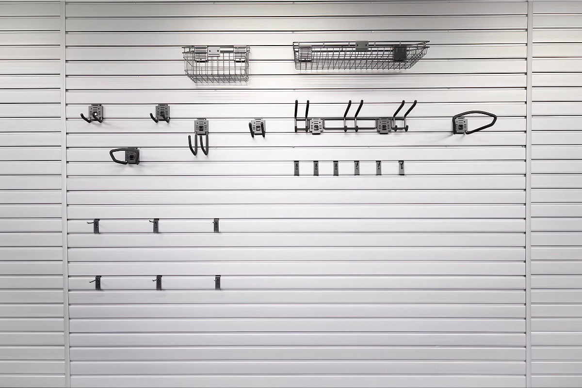 Slatwall Accessory Kits displayed on white slatwall panel with hooks, baskets, and organizers for versatile garage storage