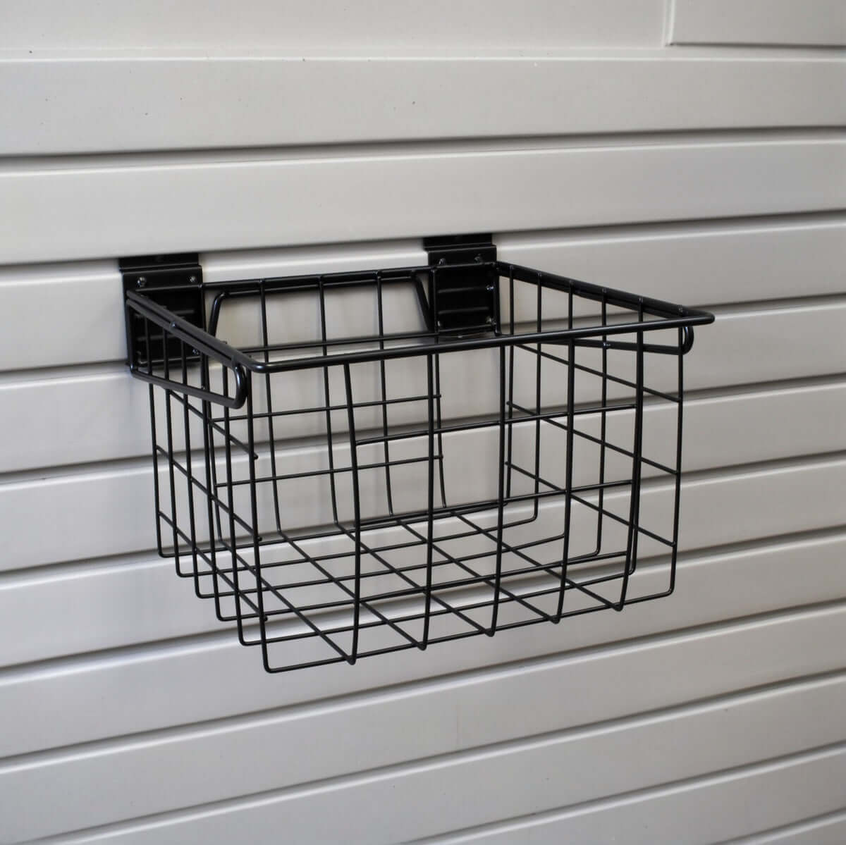 Slatwall Baskets black wire 12x12 deep basket mounted on white slatwall panel for garage storage organization