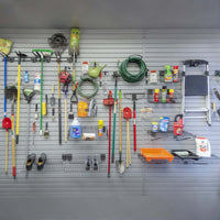 Slatwall Accessory Kits organizing garage tools, garden equipment, cleaning supplies, and shoes on a wall-mounted slatwall panel system