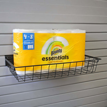 Slatwall Baskets wire shallow basket mounted on gray slatwall panel holding Bounty Essentials paper towels
